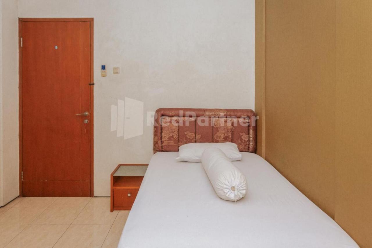 Hotel De Lugano Scbd Syariah Mitra Reddoorz Giacarta Esterno foto