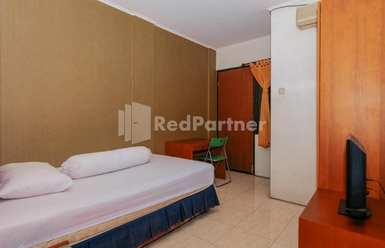 Hotel De Lugano Scbd Syariah Mitra Reddoorz Giacarta Esterno foto