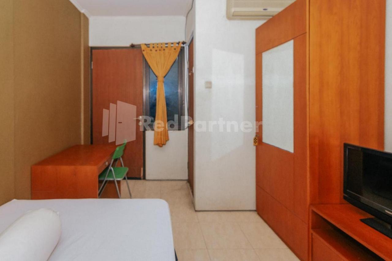 Hotel De Lugano Scbd Syariah Mitra Reddoorz Giacarta Esterno foto