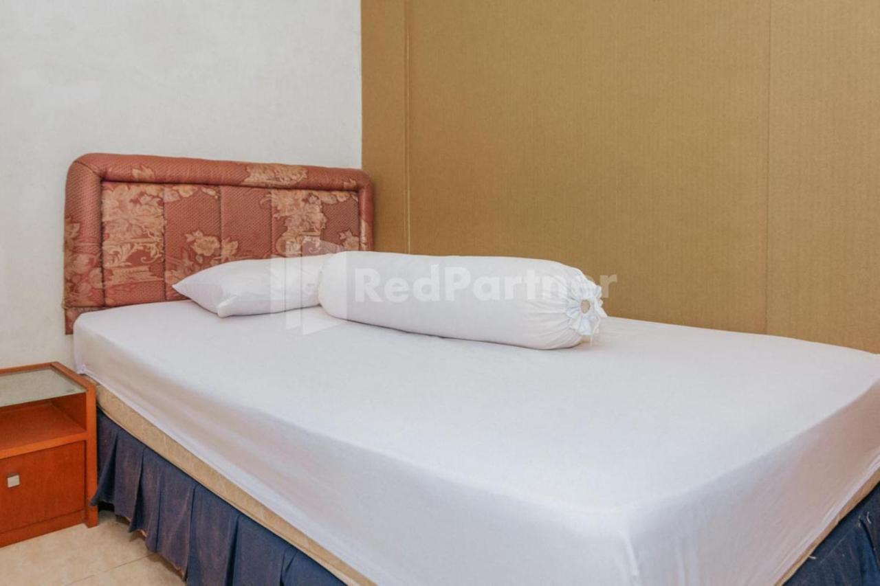 Hotel De Lugano Scbd Syariah Mitra Reddoorz Giacarta Esterno foto