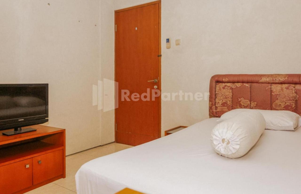 Hotel De Lugano Scbd Syariah Mitra Reddoorz Giacarta Esterno foto