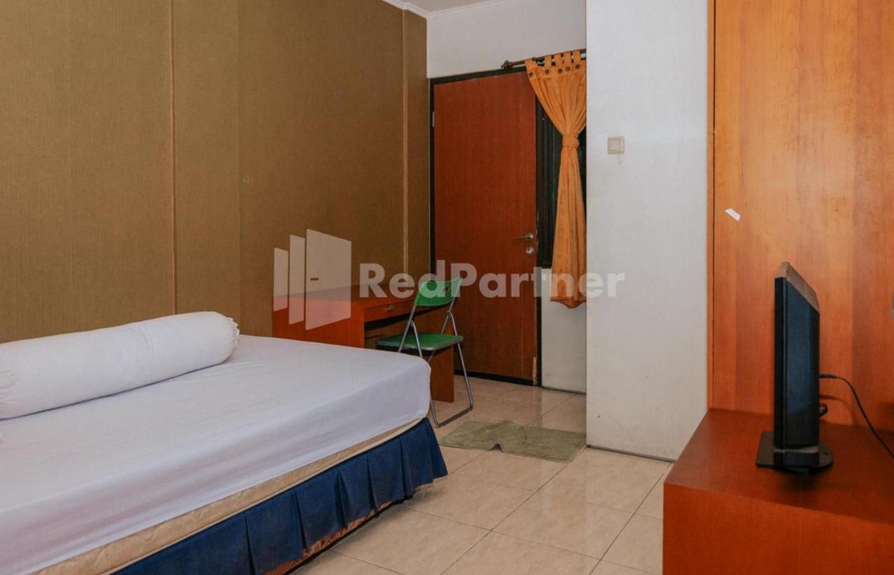 Hotel De Lugano Scbd Syariah Mitra Reddoorz Giacarta Esterno foto